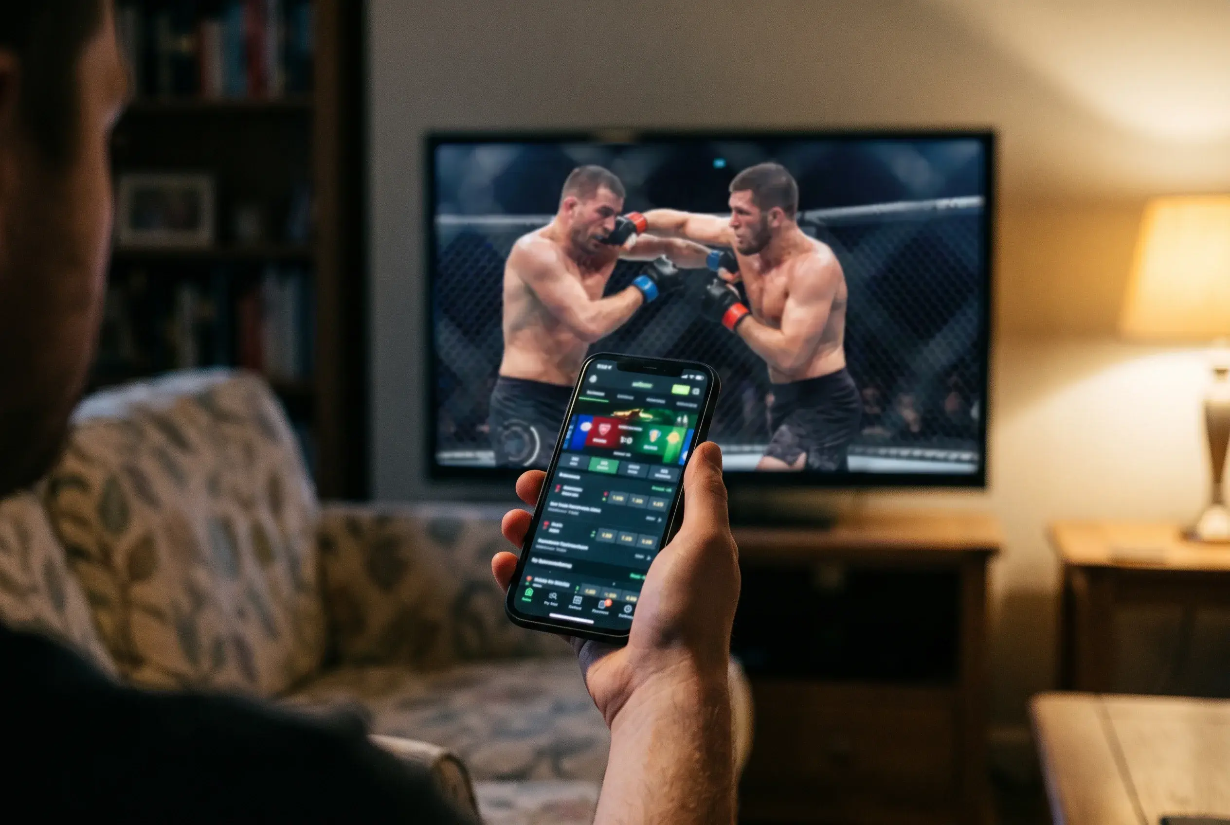 UFC live in-play betting interface with broadcast stream delay timer and cash-out value comparison